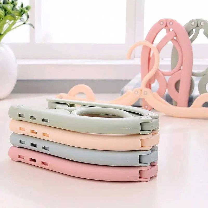 Product image Moveonesia - Travel Portable Hanger Gantungan Baju Lipat GANTUNGAN LIPAT RANDOM