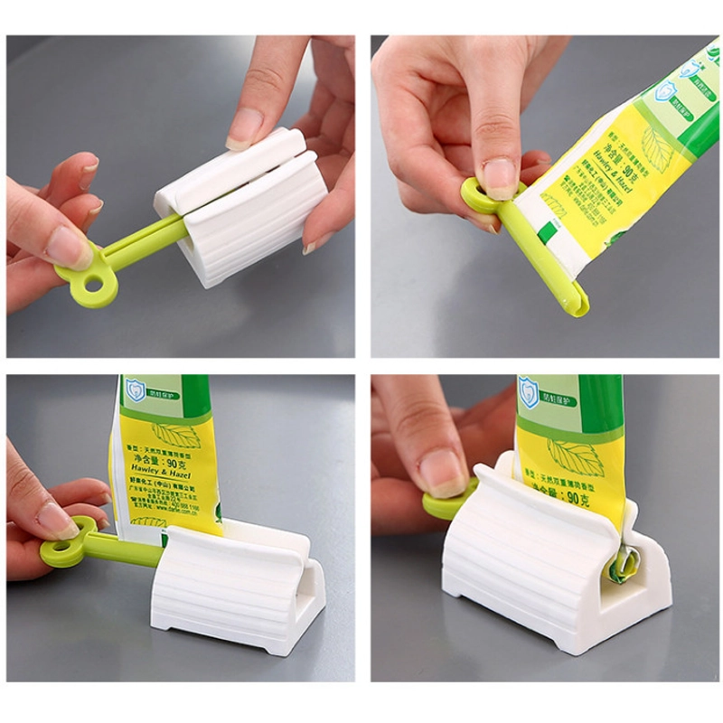 Product image KAMJE Dispenser Alat Penjepit Jepitan Penekan Odol Pasta Gigi Roll Putar KMJ140 KMJ140 RANDOM