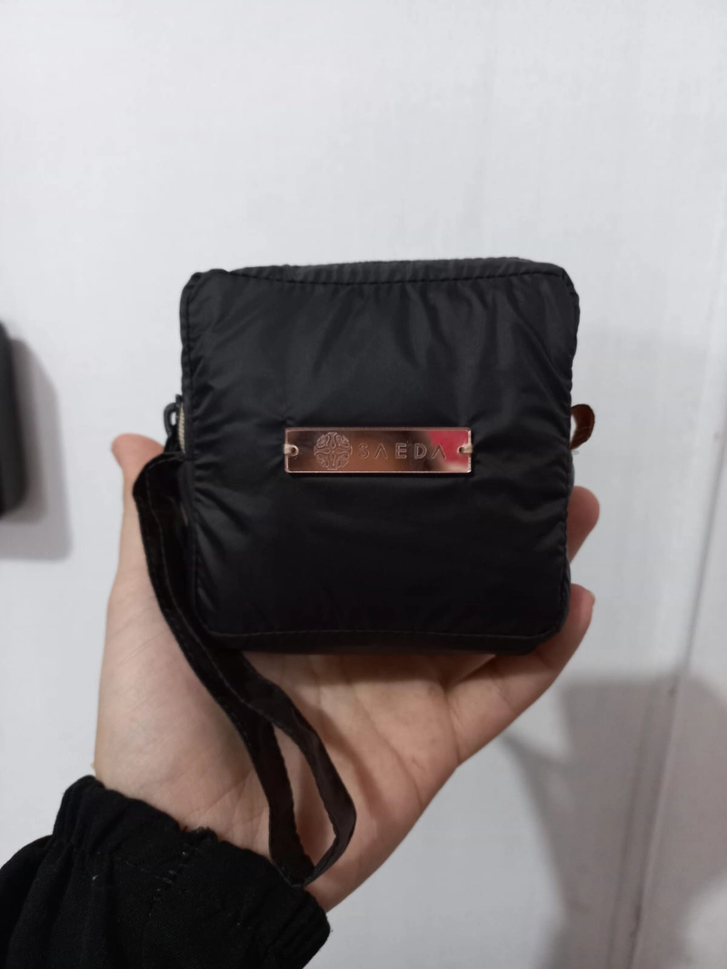 Product image Nafeesa Collection - Mukena Travel Abaya Terusan Mini Suraiya L Black Coffee