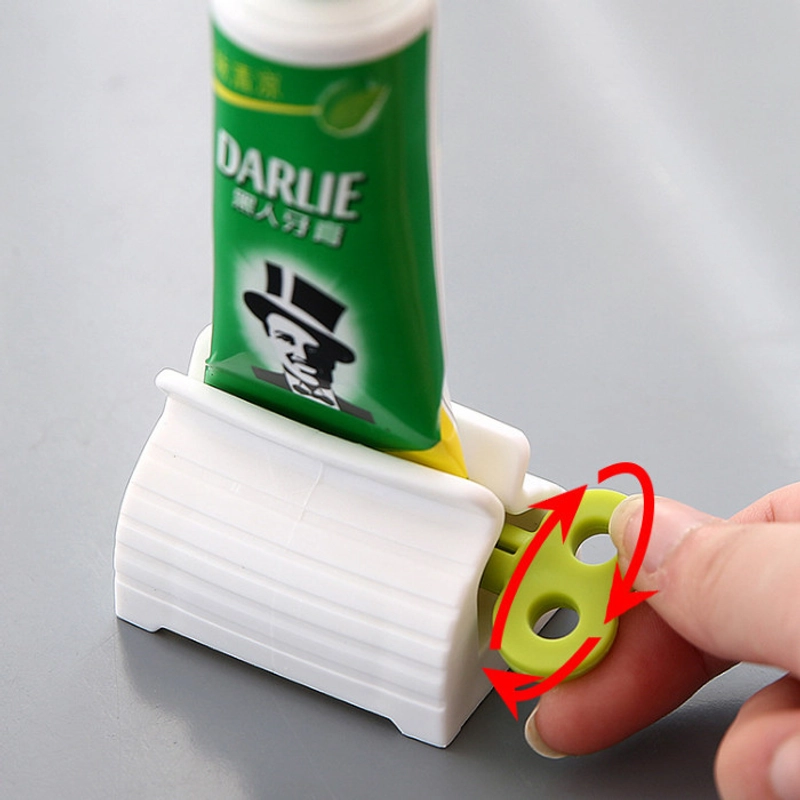 Product image KAMJE Dispenser Alat Penjepit Jepitan Penekan Odol Pasta Gigi Roll Putar KMJ140 KMJ140 RANDOM