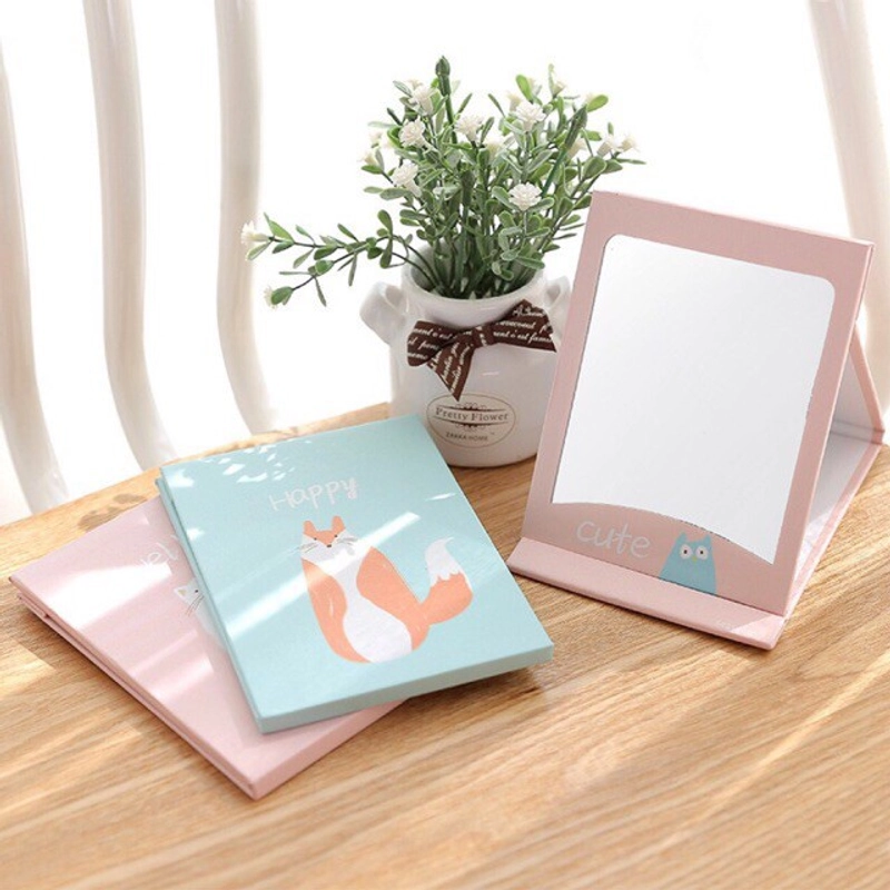 Product image Cermin Kaca Makeup Lipat Bentuk Buku / Cermin Lipat Traveling 3 Ukuran Kecil Warna Random