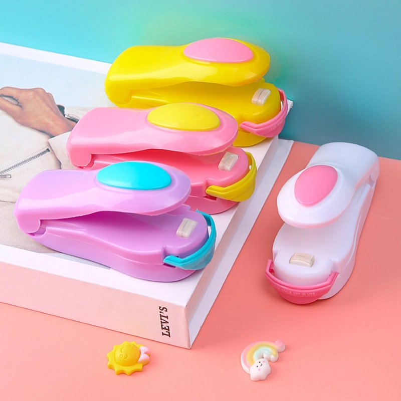 Product image KAHASIL - Alat Pres Perekat Kemasan Plastik Snack Makanan Elektrik Hand Mini Sealer Portable KMJ180 UNGU